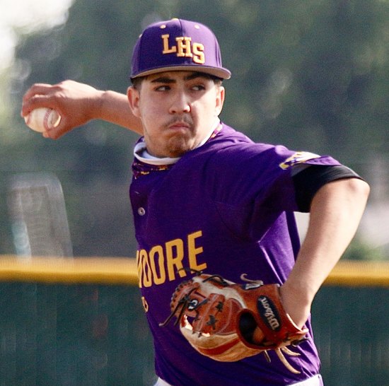 Lemoore High's Emiliano Murrillo pitches in the first inning against Hanford.